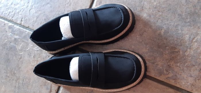 Black loafers