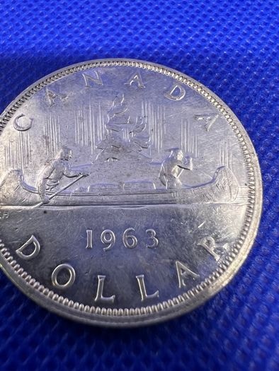 X3 Canadian silver dollar coins