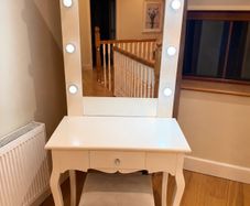 Hollywood style vanity table with mirror and light