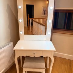 Hollywood style vanity table with mirror and light