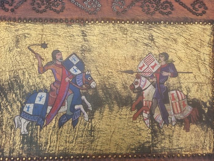 Vintage large leather painting of a medieval knights duel