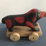 vintage wooden dog on wheels Image 4