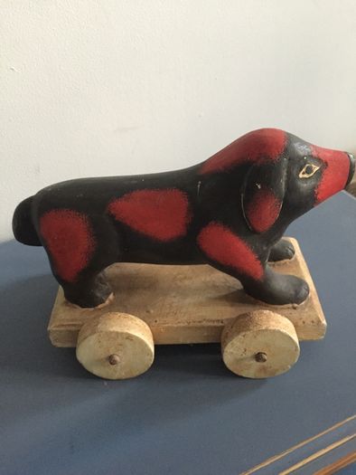 vintage wooden dog on wheels