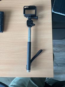 GoPro selfie stick / handheld monopod with an adjustable extension pole.