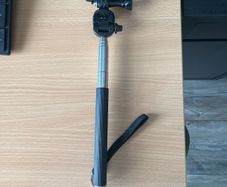GoPro selfie stick / handheld monopod with an adjustable extension pole.