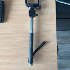 GoPro selfie stick / handheld monopod with an adjustable extension pole.