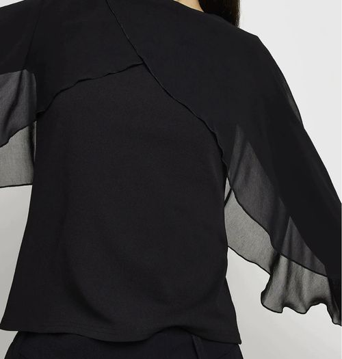 Top with cape-style overlay
