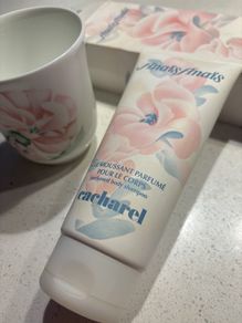 - Cacharel Anais Anais Royal Doulton 9 cm high vase / tumbler / container and Free ( almost full ) perfumed body shampoo ( 200 ml )