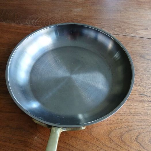 Skillet. Vintage brass, copper and stainless steel skillet.