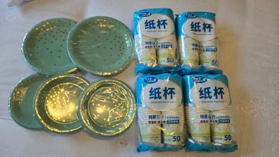 Unused paper plates and cups
