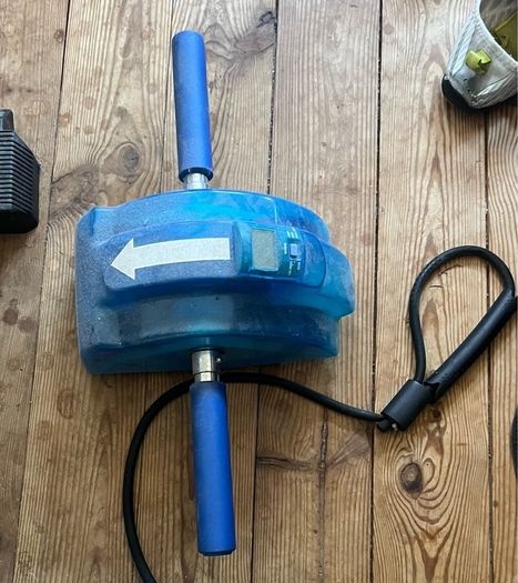 rowing machine, ab roller & stepper