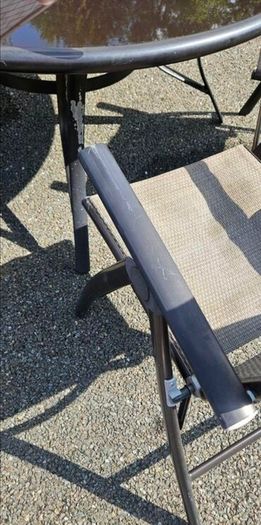 Garden furniture round table and 5 chairs.