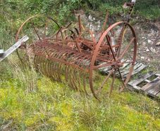 Horse drawn hay more and hay rack