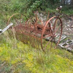 Horse drawn hay more and hay rack
