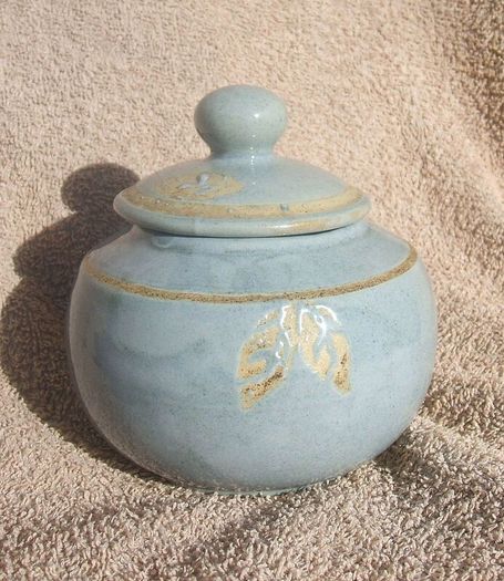 A studio pottery vase with its lid (excellent condition, no damage).