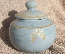 A studio pottery vase with its lid (excellent condition, no damage).