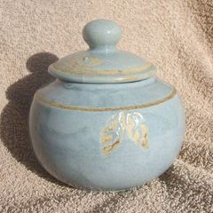 A studio pottery vase with its lid (excellent condition, no damage).