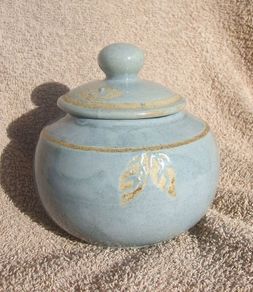 A studio pottery vase with its lid (excellent condition, no damage).