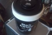 a black and white  scotch whisky ice bucket