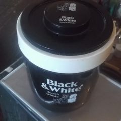 a black and white  scotch whisky ice bucket