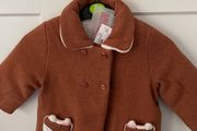 New with the rag baby coat. Size 24 months.