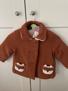 New with the rag baby coat. Size 24 months.
