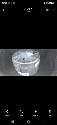 Two unused spare tyres