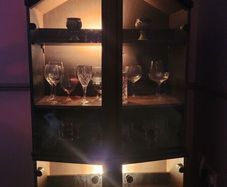 Glass Cabinet with lights, comes in two halves for easy transport