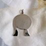 pendant of girls face. Image 3