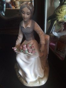 Tengra Lady on a Tree Stump Figurine