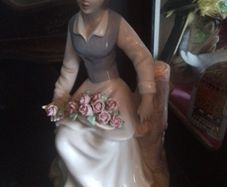 Tengra Lady on a Tree Stump Figurine