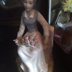 Tengra Lady on a Tree Stump Figurine
