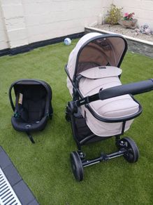 panorama xti 2-in-1 buggy with carseat and rain cover and next to me
