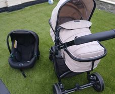 panorama xti 2-in-1 buggy with carseat and rain cover and next to me