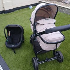 panorama xti 2-in-1 buggy with carseat and rain cover and next to me