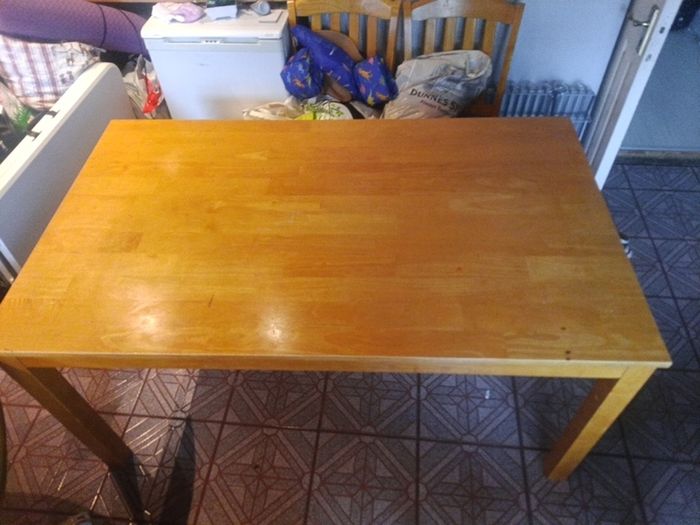 table used not too bad if you like it could be sanded to freshen it up or put a cover over it but solid plenty of life left in it just the table