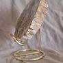 Fossilized wood, Madagascar, Triassic period. With metal display stand. Image 4