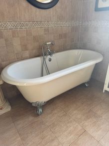 Victorian style roll top bath