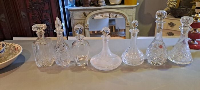 7 X Cut Crystal Decanters