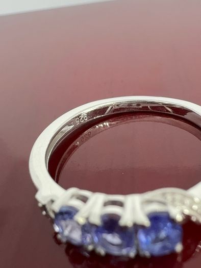 Silver Tanzanite Trilogy Ring in Platinum Overlay Sterling Silver.