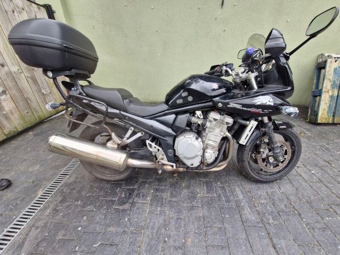 2007 black susuki bandit 1250 including luggage boxes .