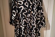 Yours Curve swirl print shirt dress, with long sleeves.