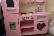 Pink toy kitchen