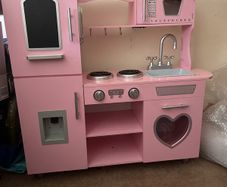 Pink toy kitchen