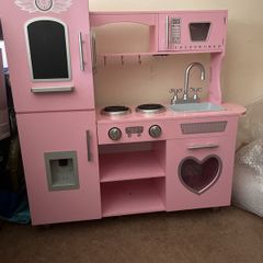 Pink toy kitchen