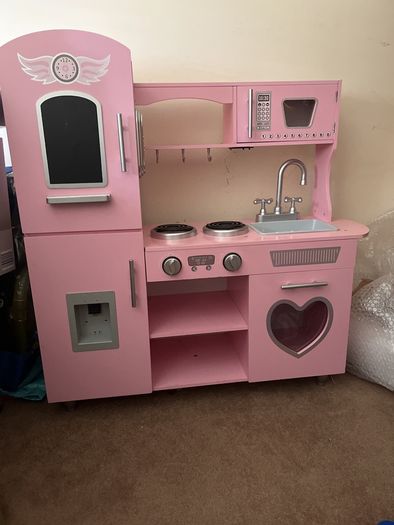 Pink toy kitchen