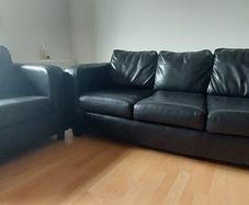Black sofa and  matching chair