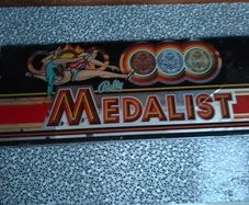 Vintage Bally "Medalist" slot machine glass panel belly glass 1970s