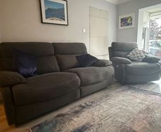 reclining sofa and arm chair