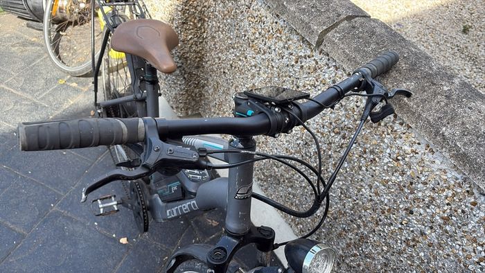 carrera electric bike no charger wheel flat